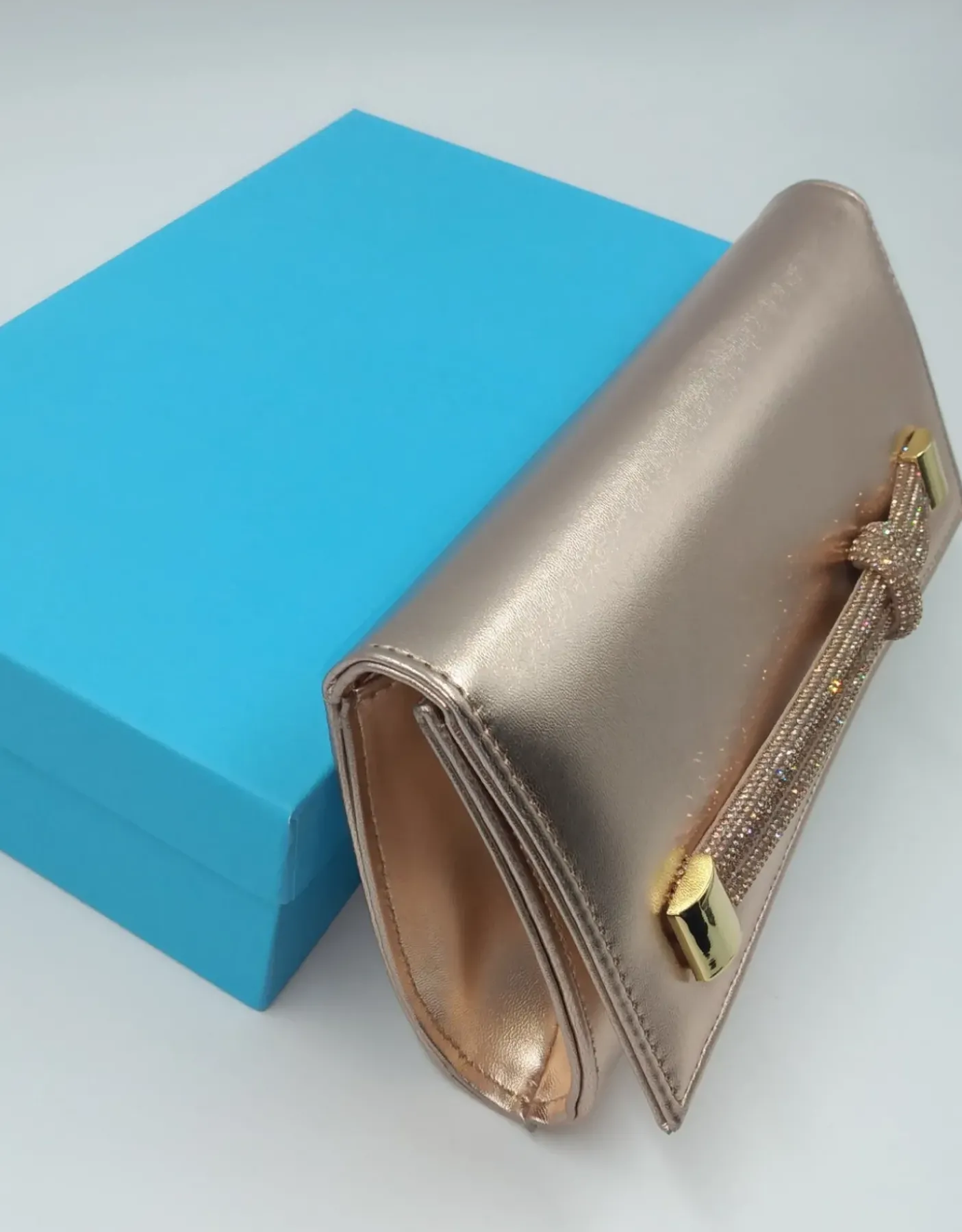 POCHETTE RAME CON DETTAGLI STRASS