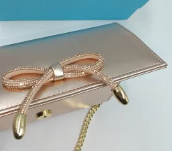 POCHETTE RAME CON FIOCCO STRASS