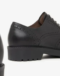 STRINGATE FRANCESINE PELLE NERA